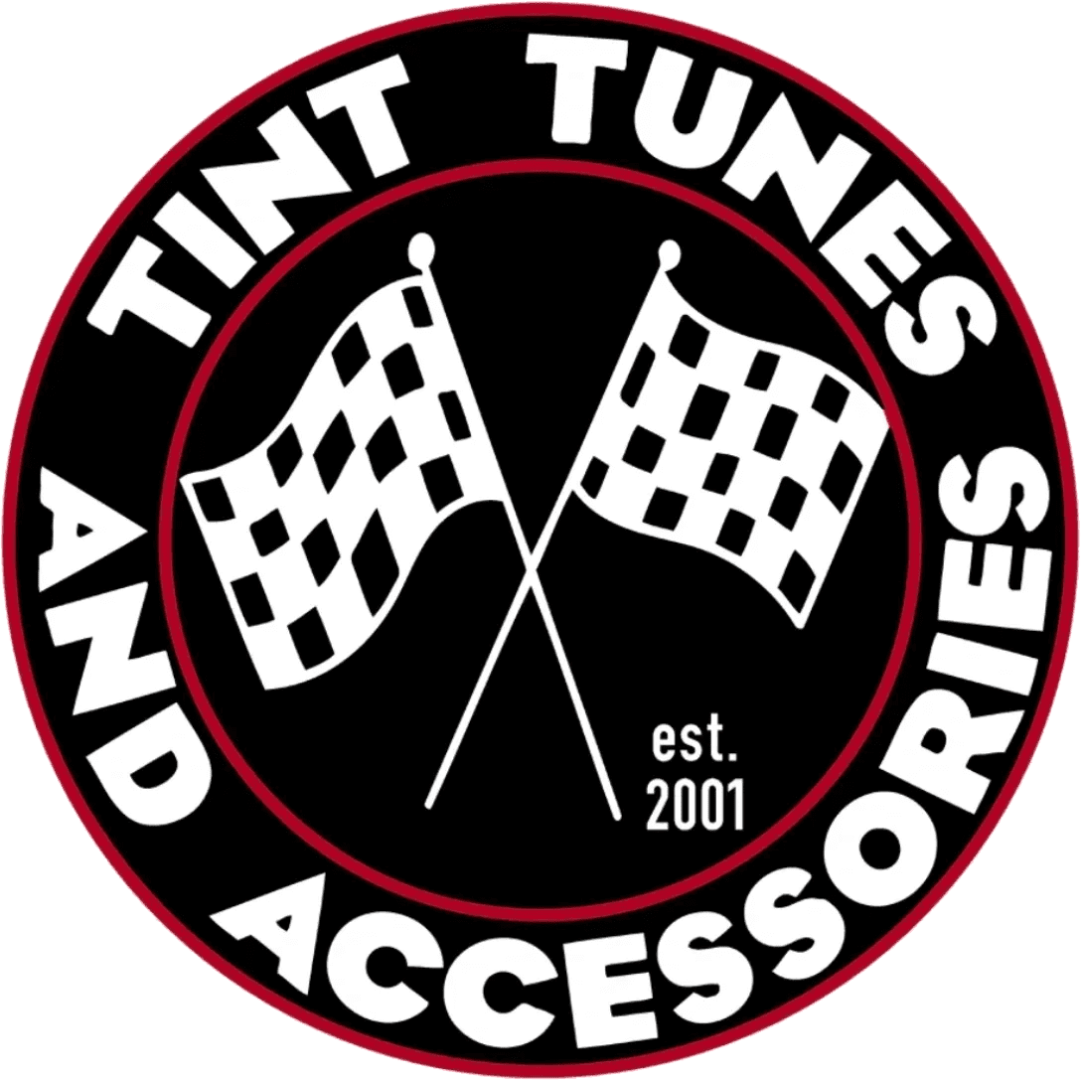A black and white logo of tint tunes and accessories.